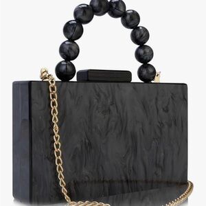 Black Marble Acrylic Handbag
Gold chain scrap is not included